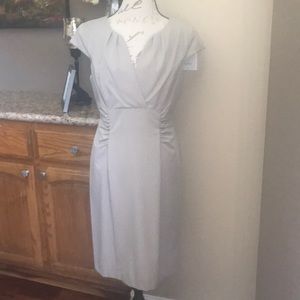 Tan colored cinched waist V-neck dress